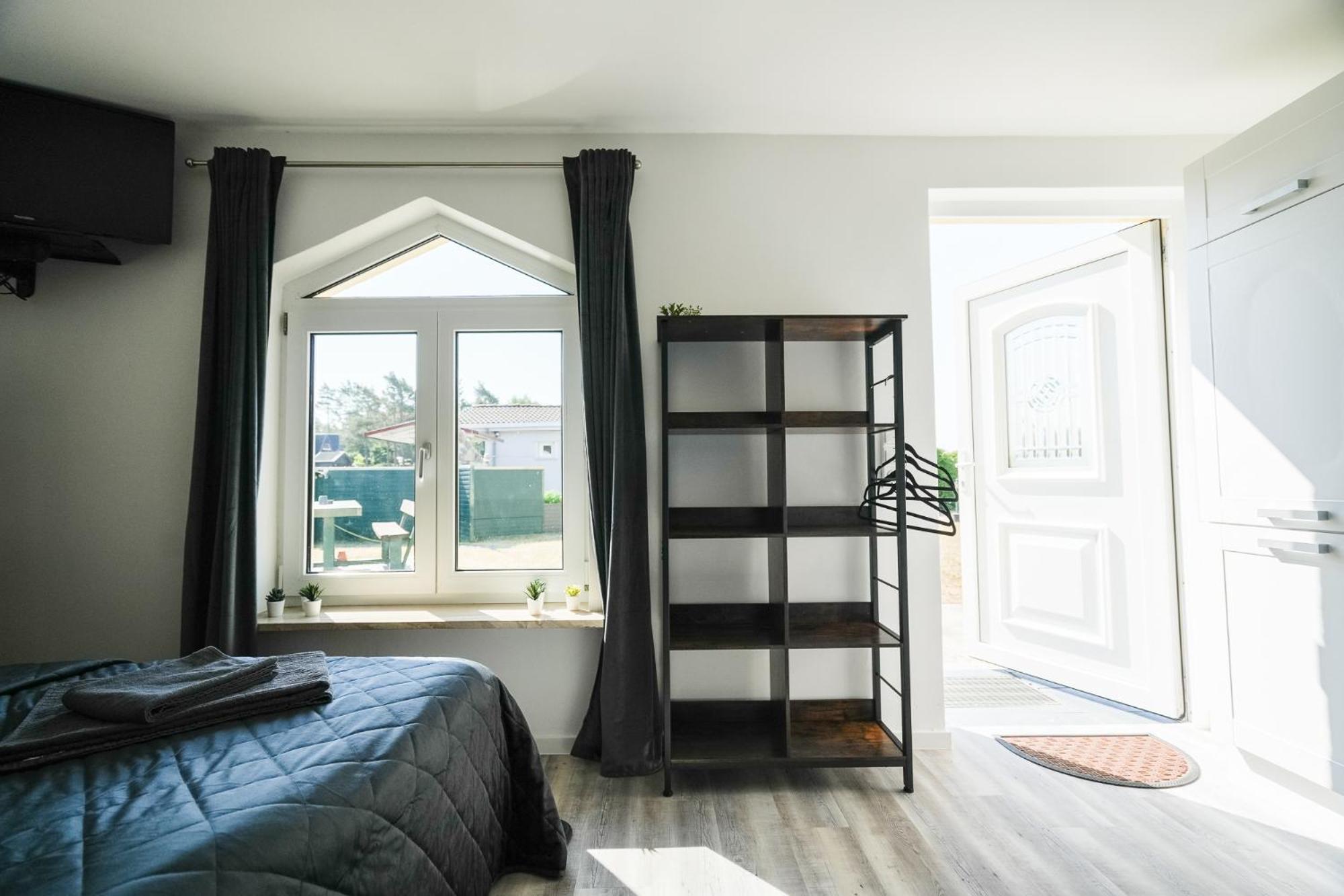 Black Tiger Seaside - Ferienwohnungen Direkt Am See Garden Habitación foto